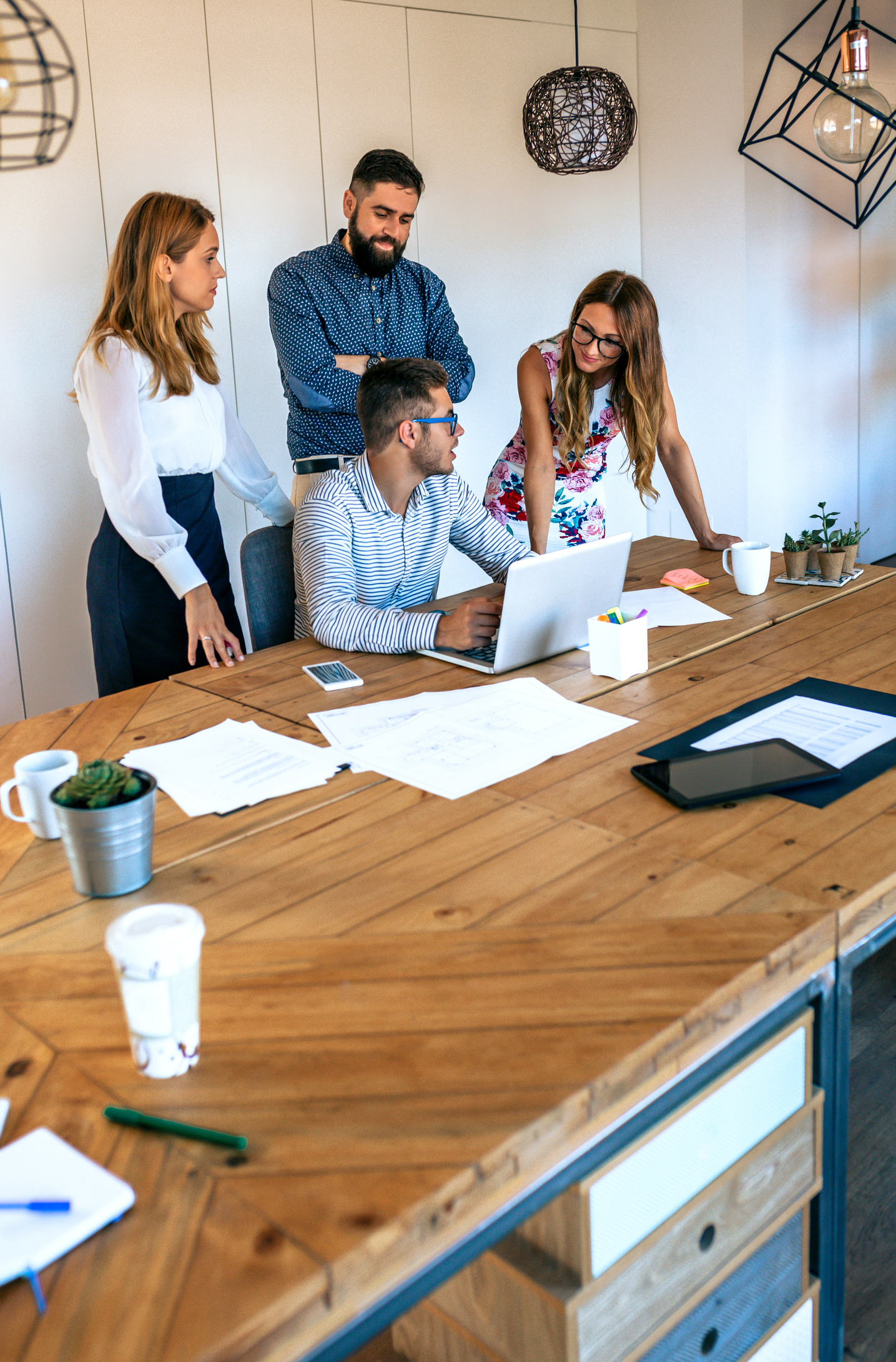 Business People in Meeting Evaluating Trainee Worker